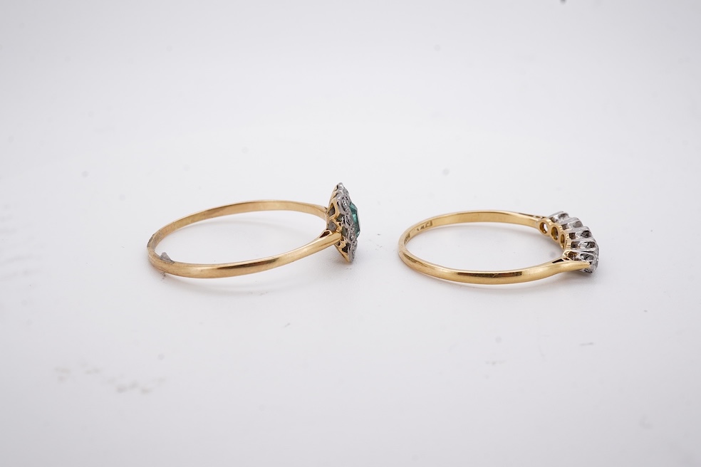 An 18ct and plat. five stone diamond set half hoop ring, size V together with a yellow metal emerald and diamond set tablet ring, size Z+++, gross weight 4.5 grams. Condition - fair